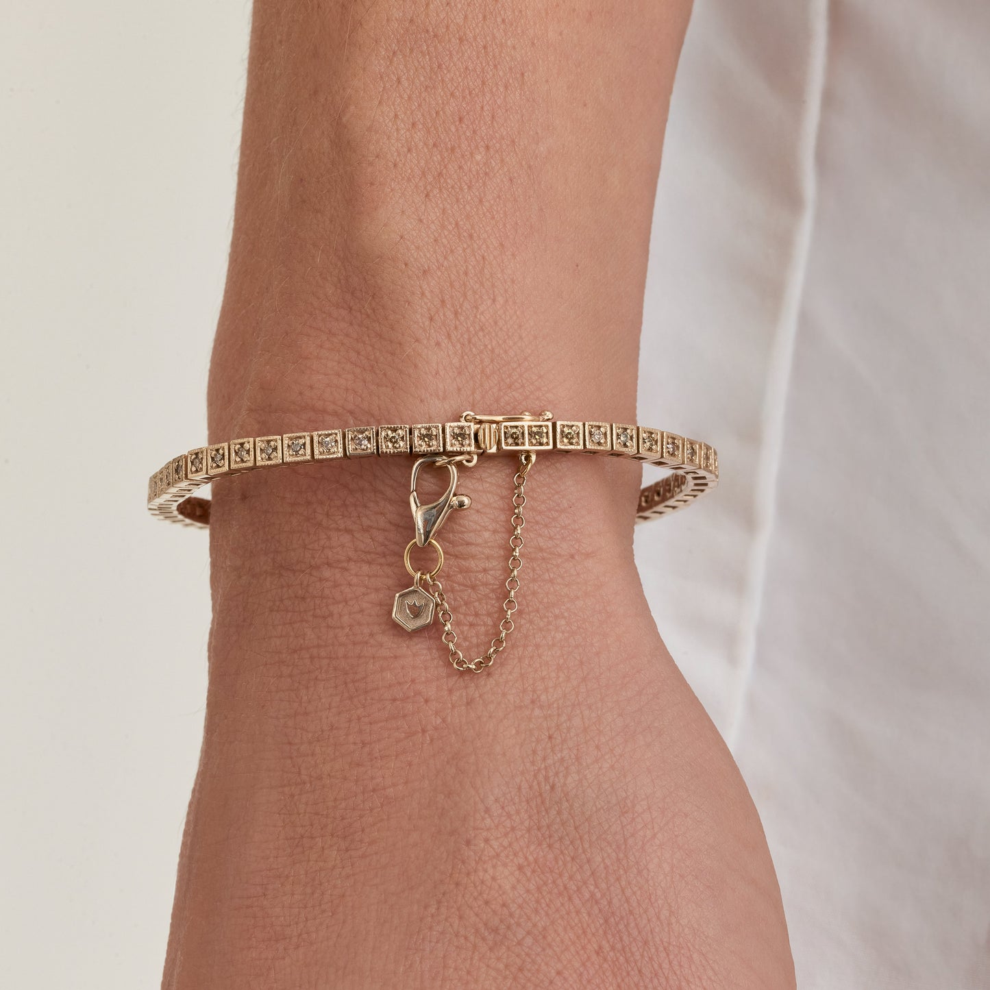 Riviera One | Diamantes Brown e Ouro Champanhe