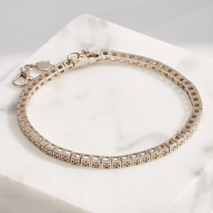 Riviera One | Diamantes Brown e Ouro Champanhe